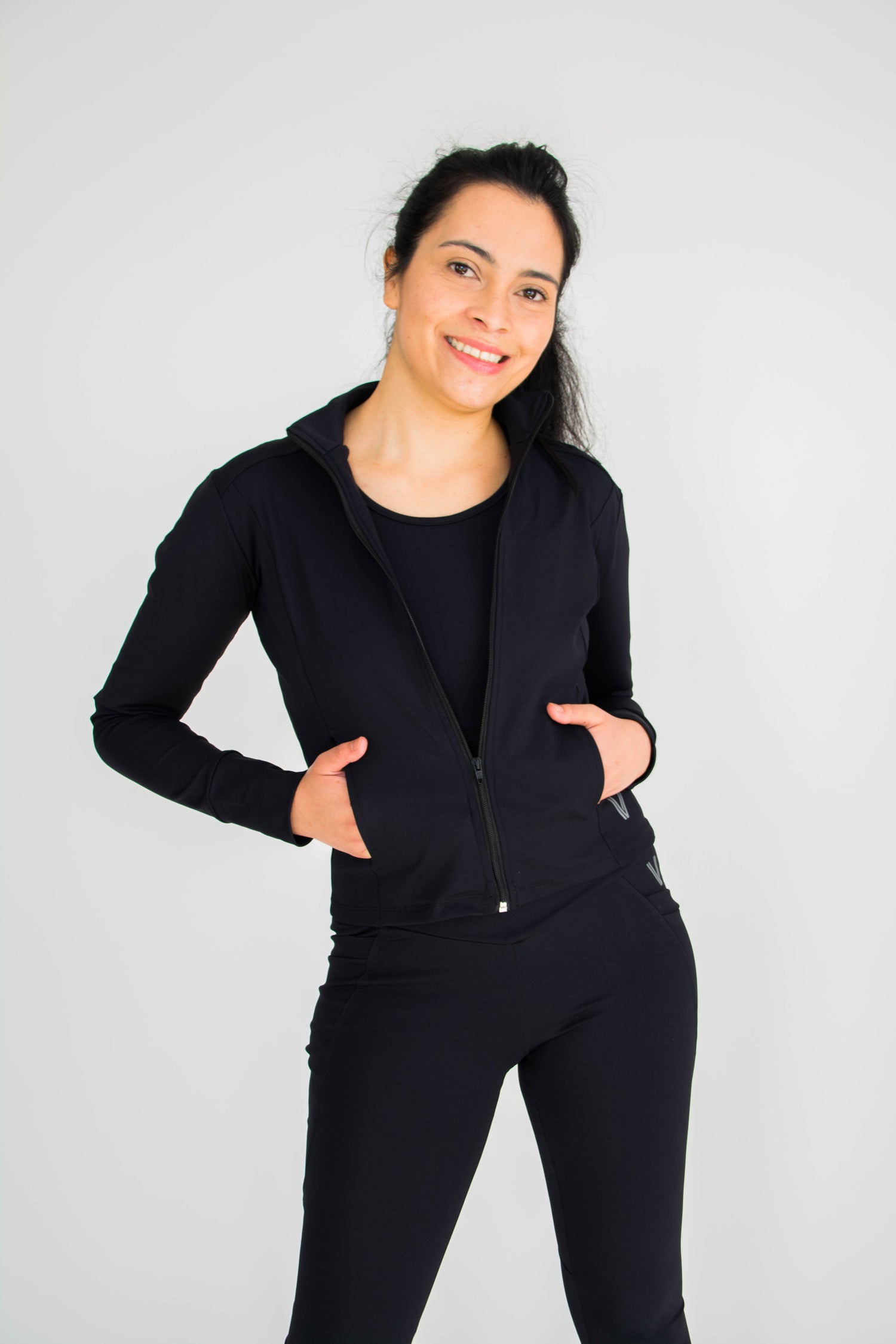 Sustainable activewear black jacket | Front