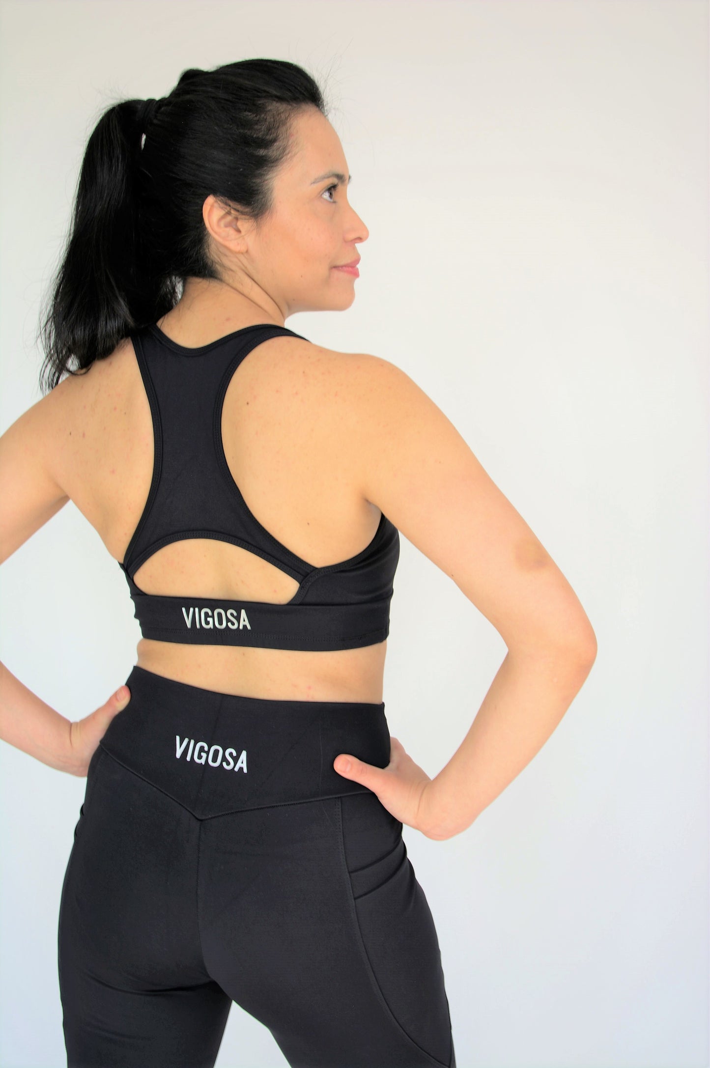 Sustainable activewear black bra | back